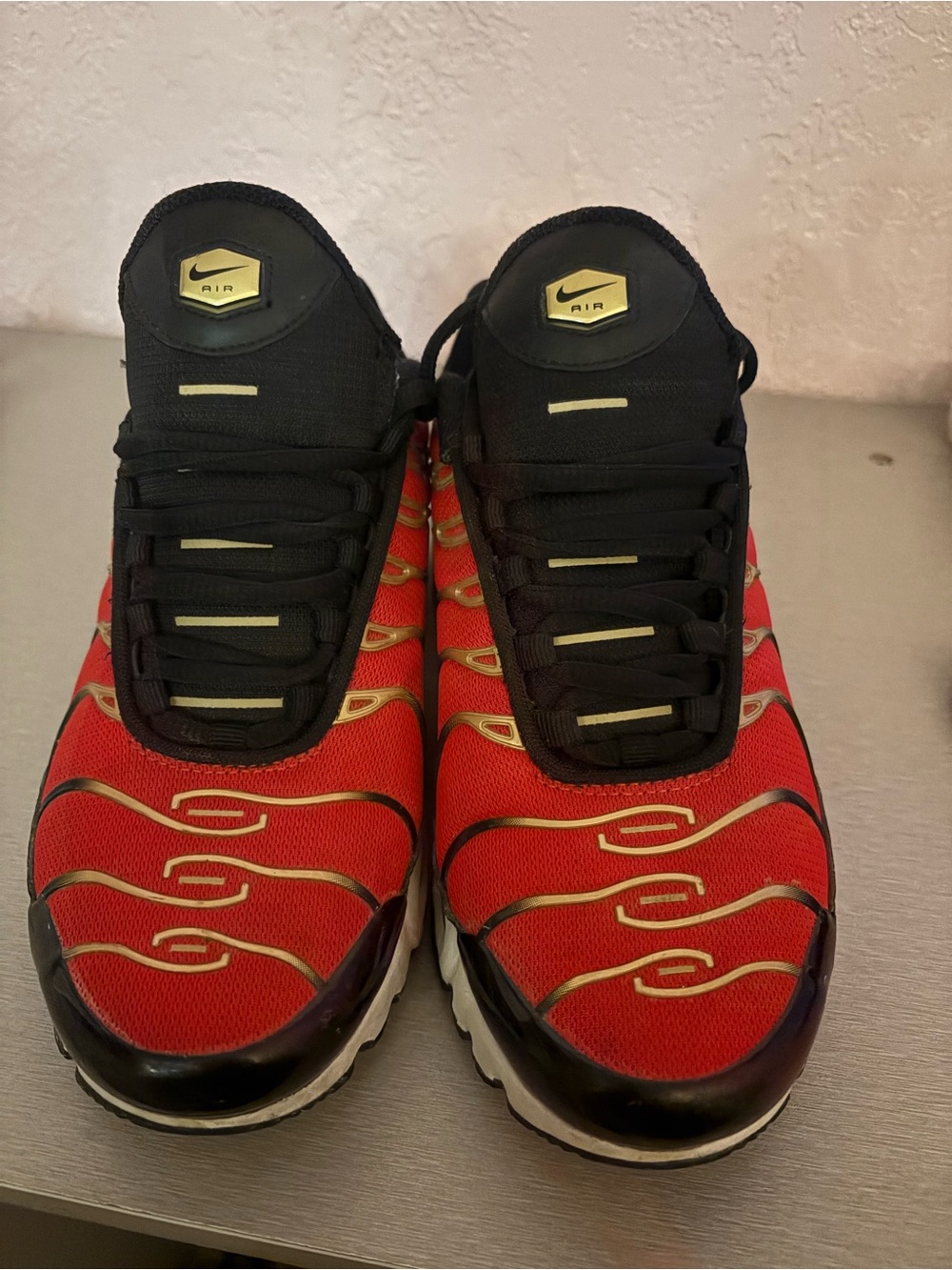 Nike Men’s Red and Black Air Sneakers with Gold Accents
